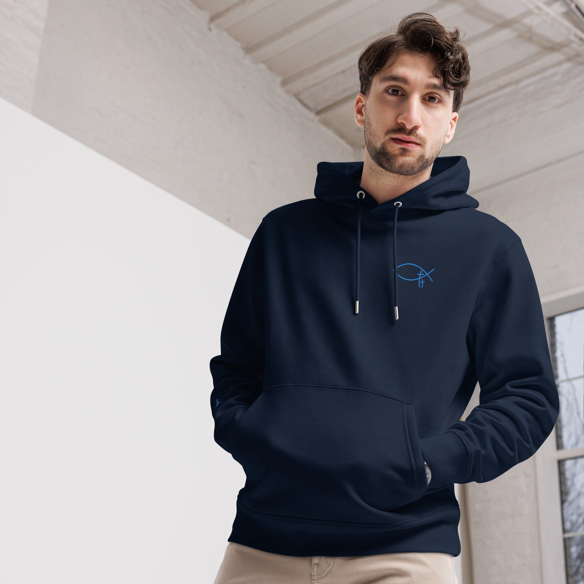 Premium Christian hoodie rooted in Jesus Christ with embroidered chest detail